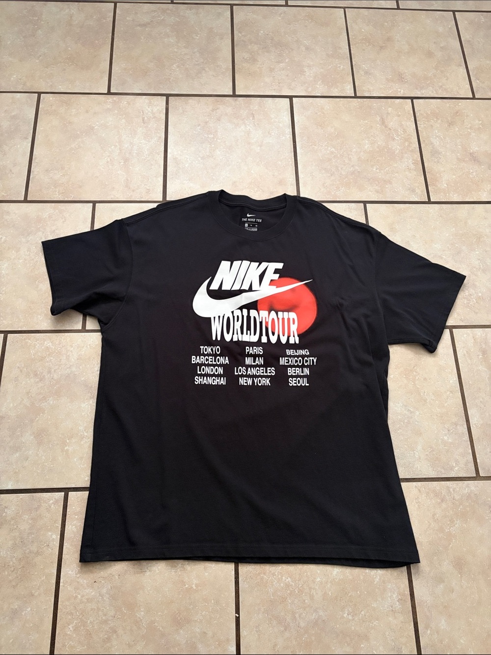 Used Nike Black Graphic 'World Tour' Tee with Red Accent